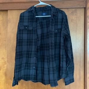 Plaid button down shirt.